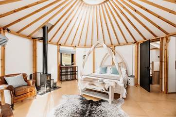The sumptuous king-sized bed sits proudly in the centre of the roundhouse.