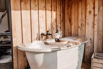 Or, as the sun begins to dip beyond the valley, run yourself a hot bubble bath and sink into the bubbles, admiring the nature surrounding your humble abode.