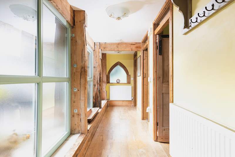 The bright hallway leads to the bedrooms and family bathroom.