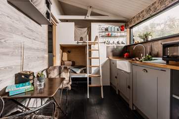 The quirky built-in bunk-beds are perfect for children under 13.