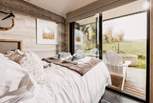 The main bedroom oozes peace and tranquility, with a view that will simply take your breath away.