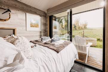 The main bedroom oozes peace and tranquility, with a view that will simply take your breath away.