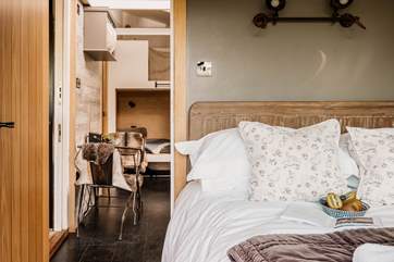 Head through to the dreamy bedroom.
