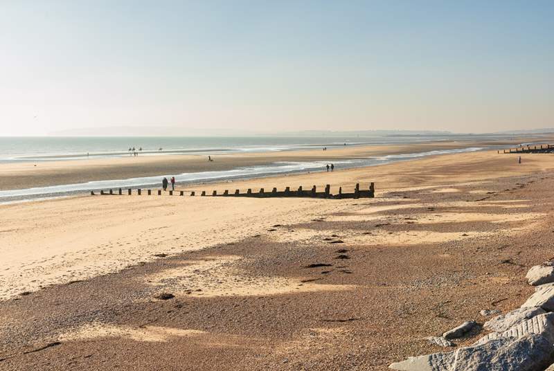 Take a trip to Camber Sands with its picturesque dunes. 