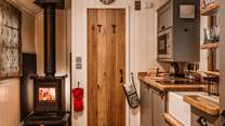 Light the warming wood-burner and stay snug throughout the seasons. 