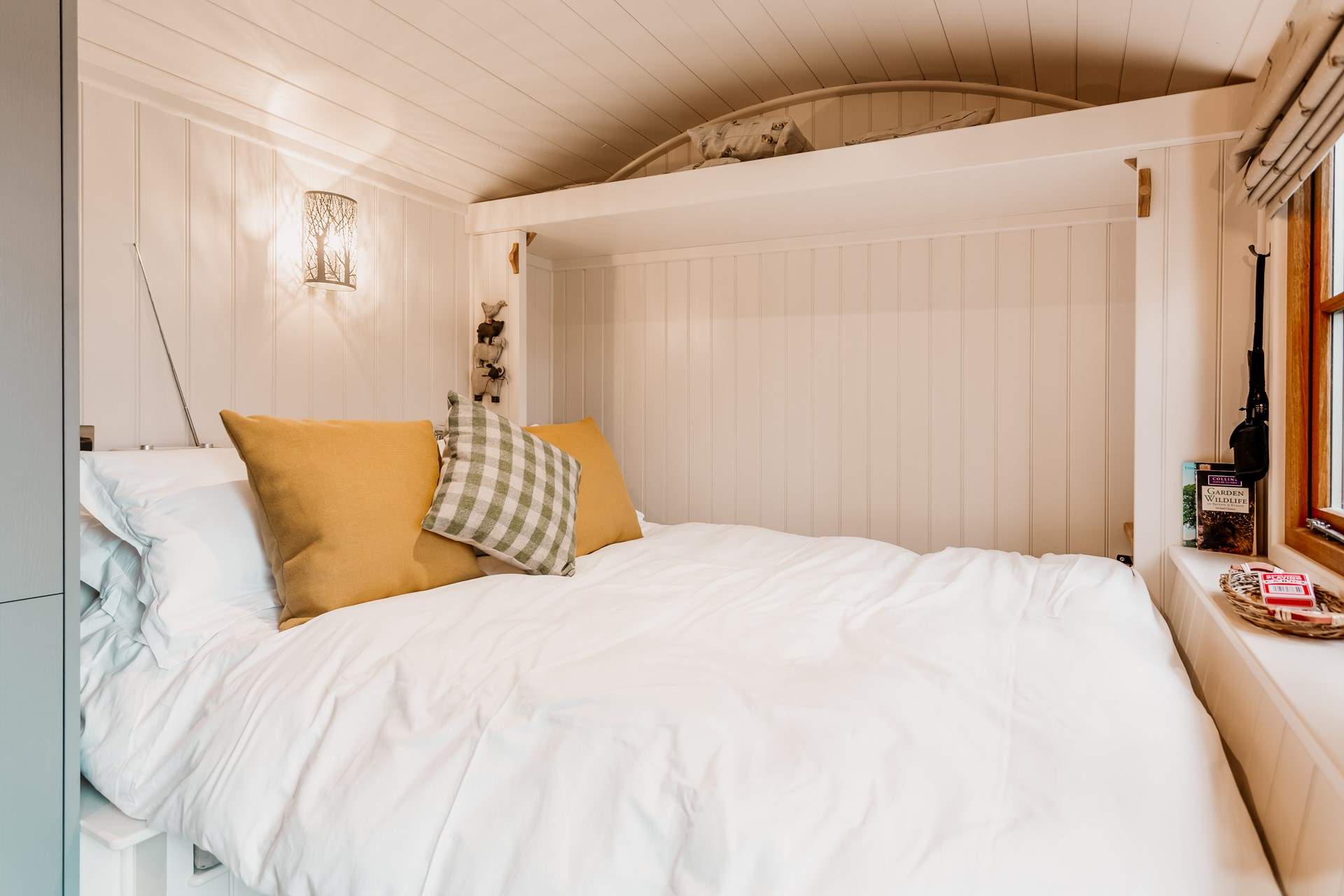 The cosy double bed folds up into the wall, utilising the space perfectly. 