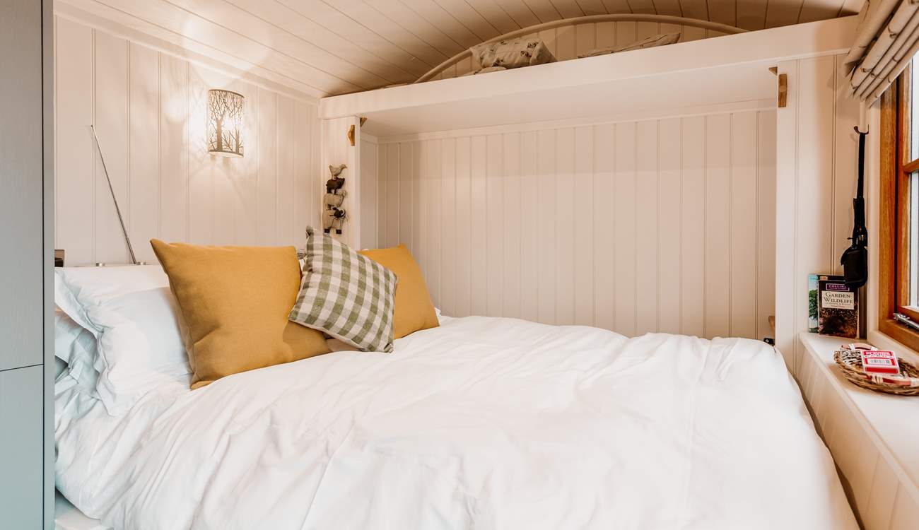 The cosy double bed folds up into the wall, utilising the space perfectly. 