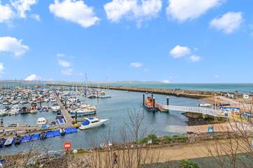 Watch the comings and goings in the harbour year-round.
