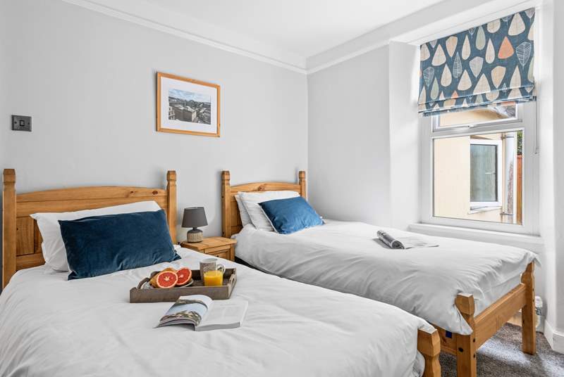 The pretty twin bedroom on the first floor is suitable for either children or adults.