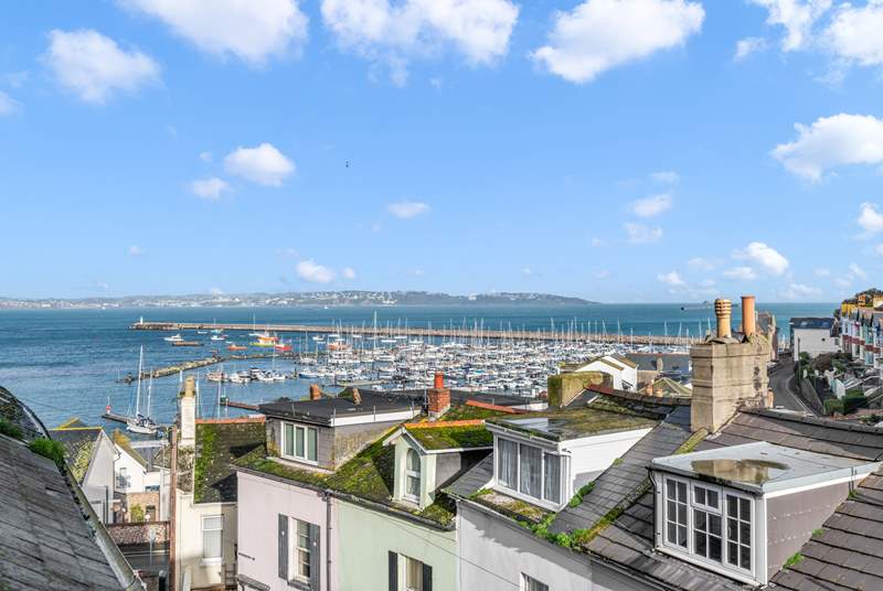 Take in the views over the rooftops to the pretty harbour. The fabulous view from bedroom three.