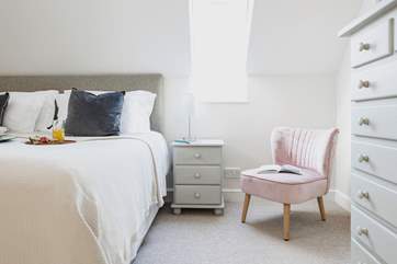 The bedroom is delightful.