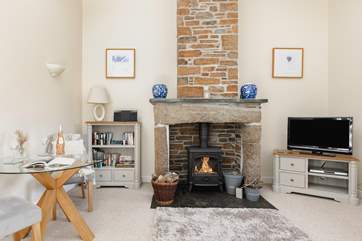 Snuggle up in front of the wood-burner and enjoy a movie on the Smart TV.