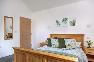 A comfy king-size bed awaits in the bedroom.