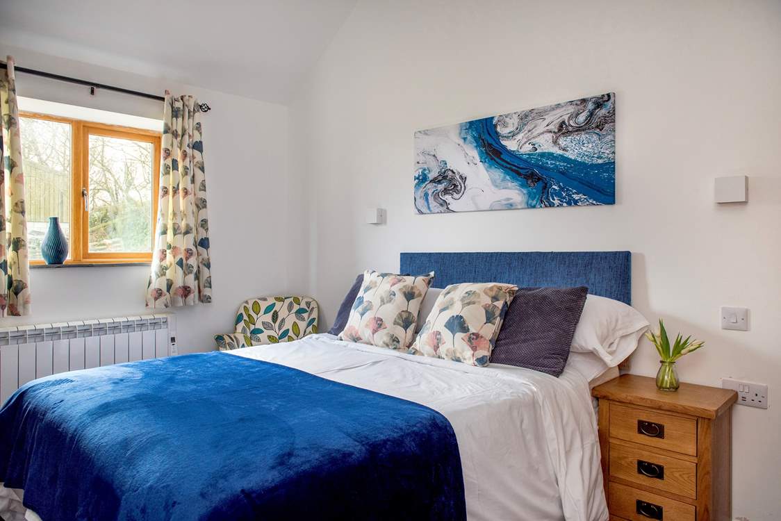 One beautifully dressed bed awaits.