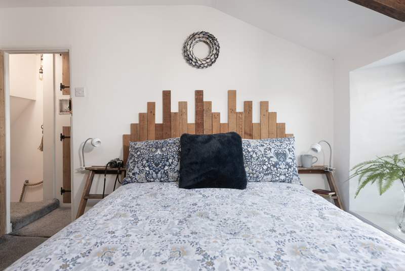 We love the clever design of the headboard in bedroom 2.