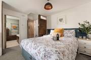 The 2 bedrooms are oh so pretty.