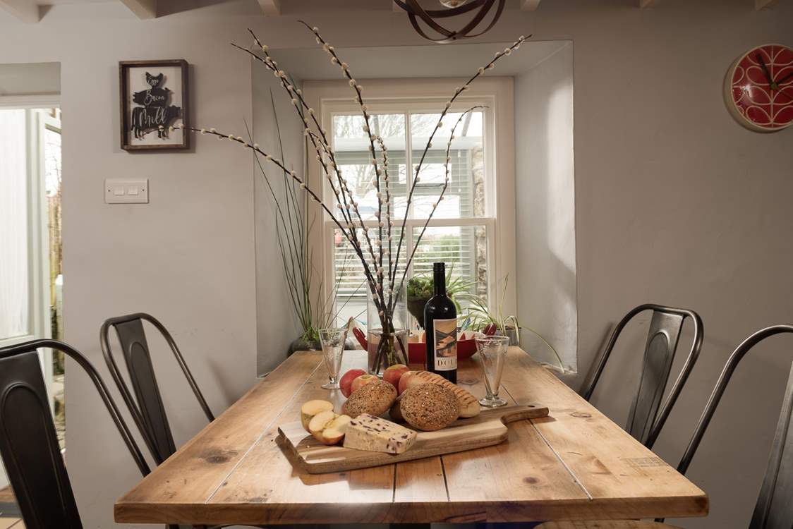 Gather everyone around the table to chat about the adventures of the day.