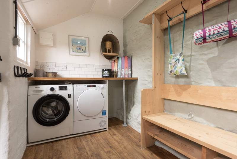 At the front of the cottage you have a handy (very spacious) utility-room which has a freezer, washing machine and tumble-drier (plus room to store buckets and spades).