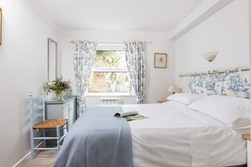 Oh so pretty, the double bedroom is a delightful space.