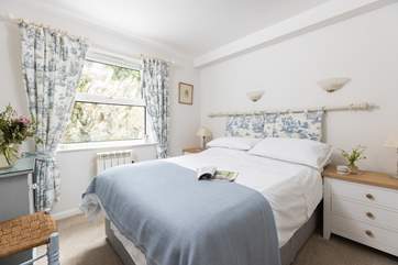 The pretty double bedroom, perfect for a restful night.