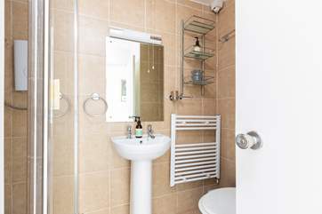 The shower-room also has a handy washing machine and tumble-drier.