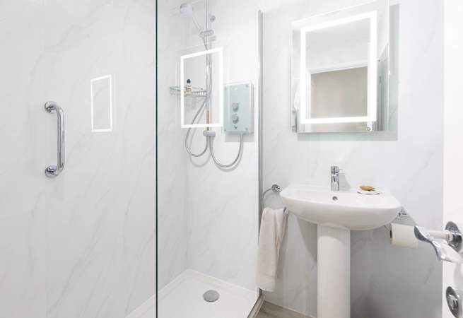 The shower-room also has a handy washing machine and tumble-drier. 