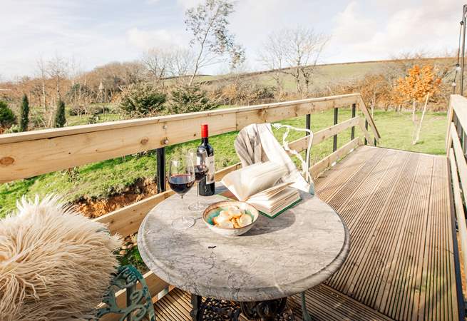 Step out onto the decking and admire rolling countryside hills.