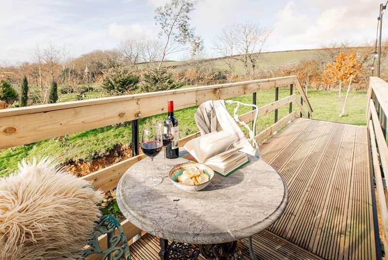 Step out onto the decking and admire rolling countryside hills.