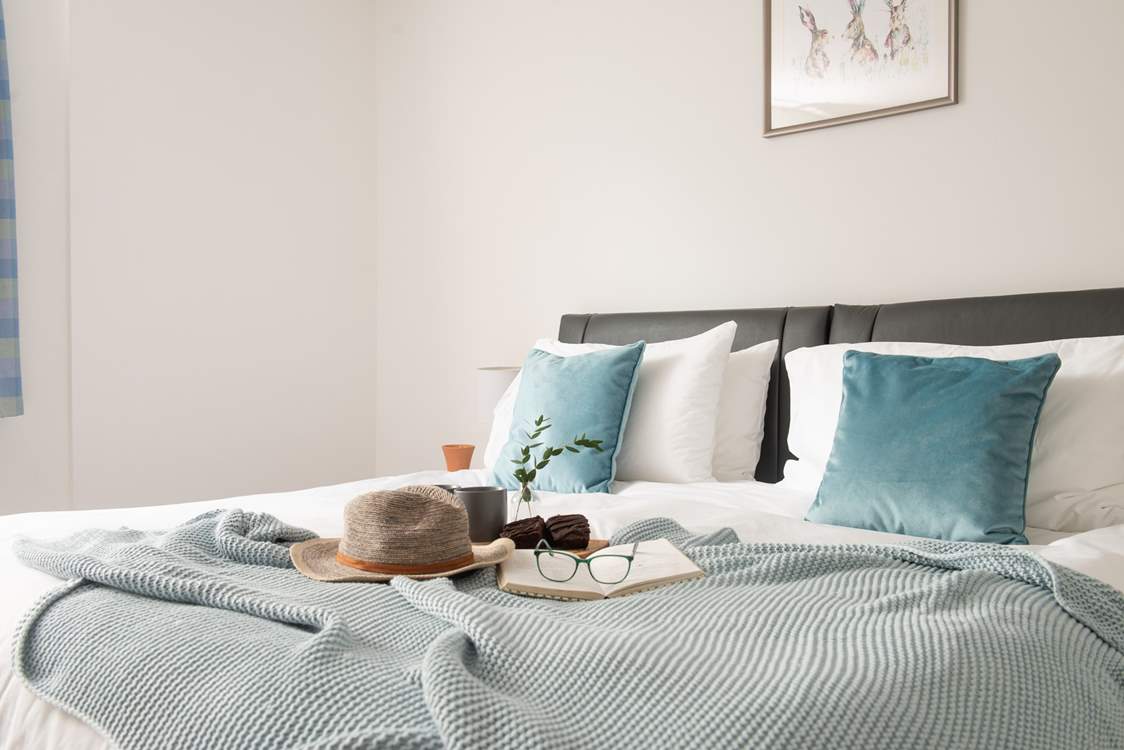 Soothing shades in the second bedroom