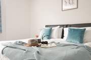 Soothing shades in the second bedroom