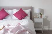 Pretty pinks in bedroom one.