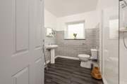 The Garden Lodge has a separate shower-room .