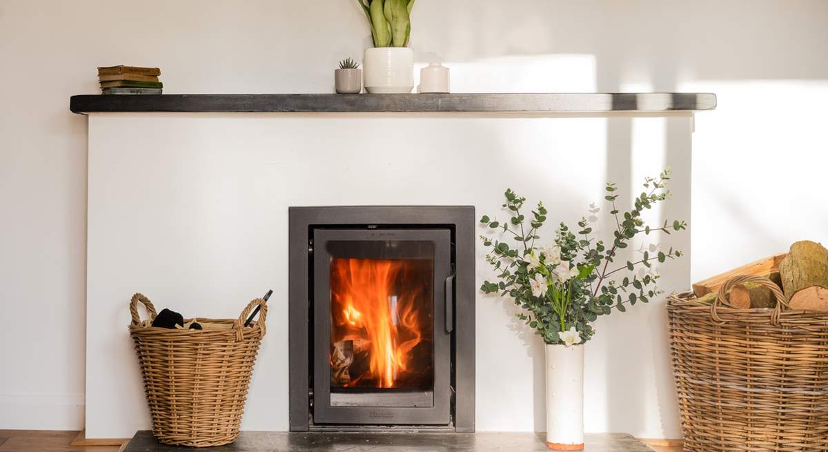 Settle together for cosy nights beside the wood-burning stove.