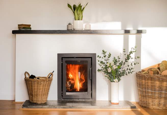 Settle together for cosy nights beside the wood-burning stove.