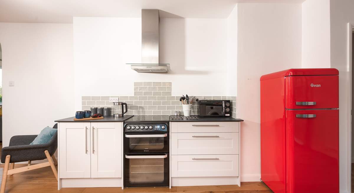 The retro fridge/freezer enhances the stylish kitchen.