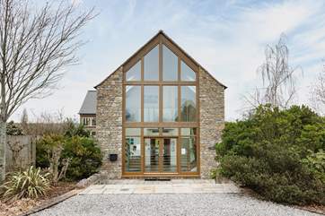 The spa building where you will find the pool, gym and library.