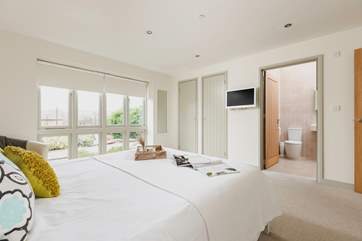 Beautiful bedroom 1 has an en suite bathroom.