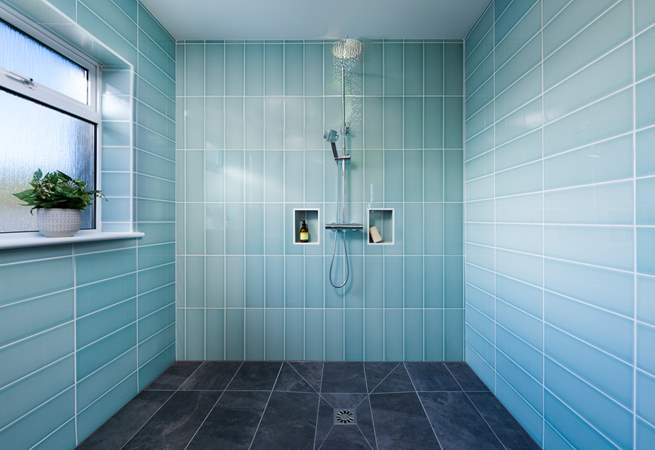 What a luxury this room is, plenty of room for one or two under this shower.