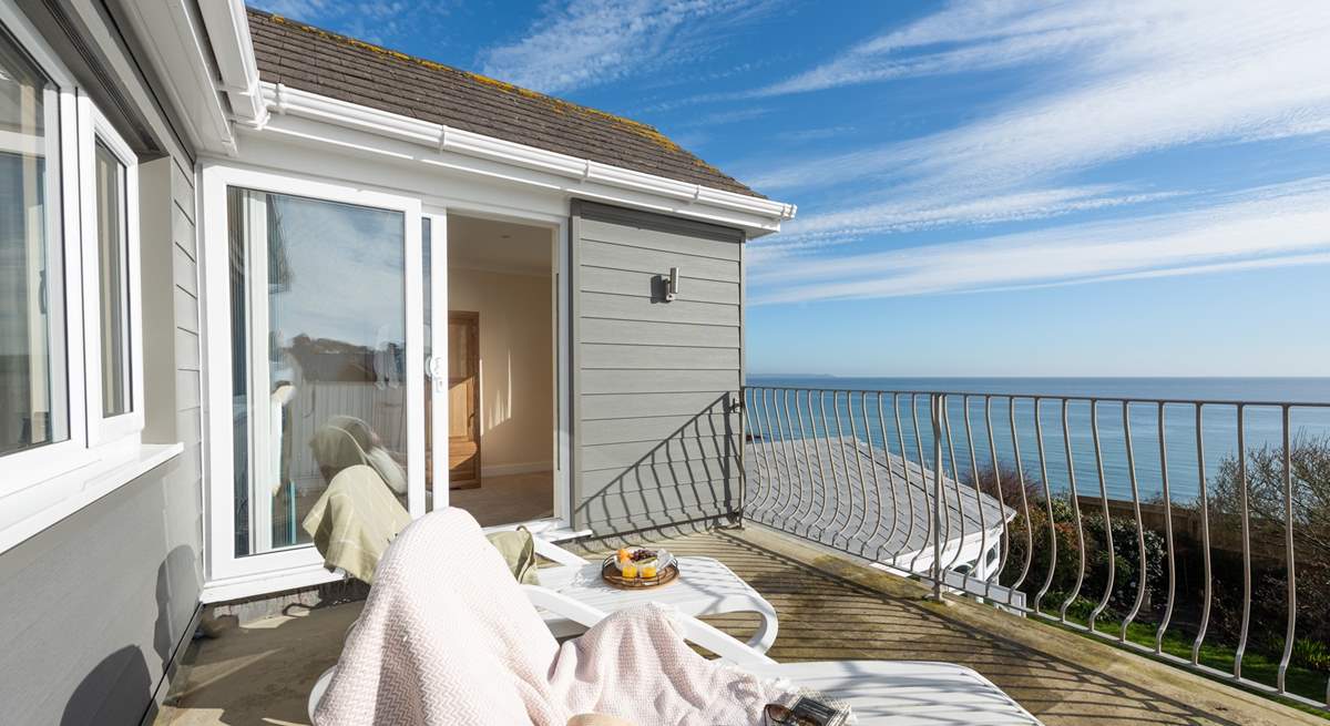 From the first bedroom sliding doors lead out onto the balcony.