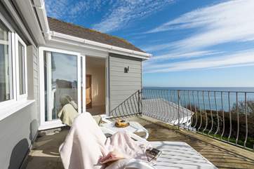 From the first bedroom sliding doors lead out onto the balcony.