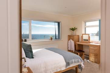 A comfy double bed awaits in bedroom two.