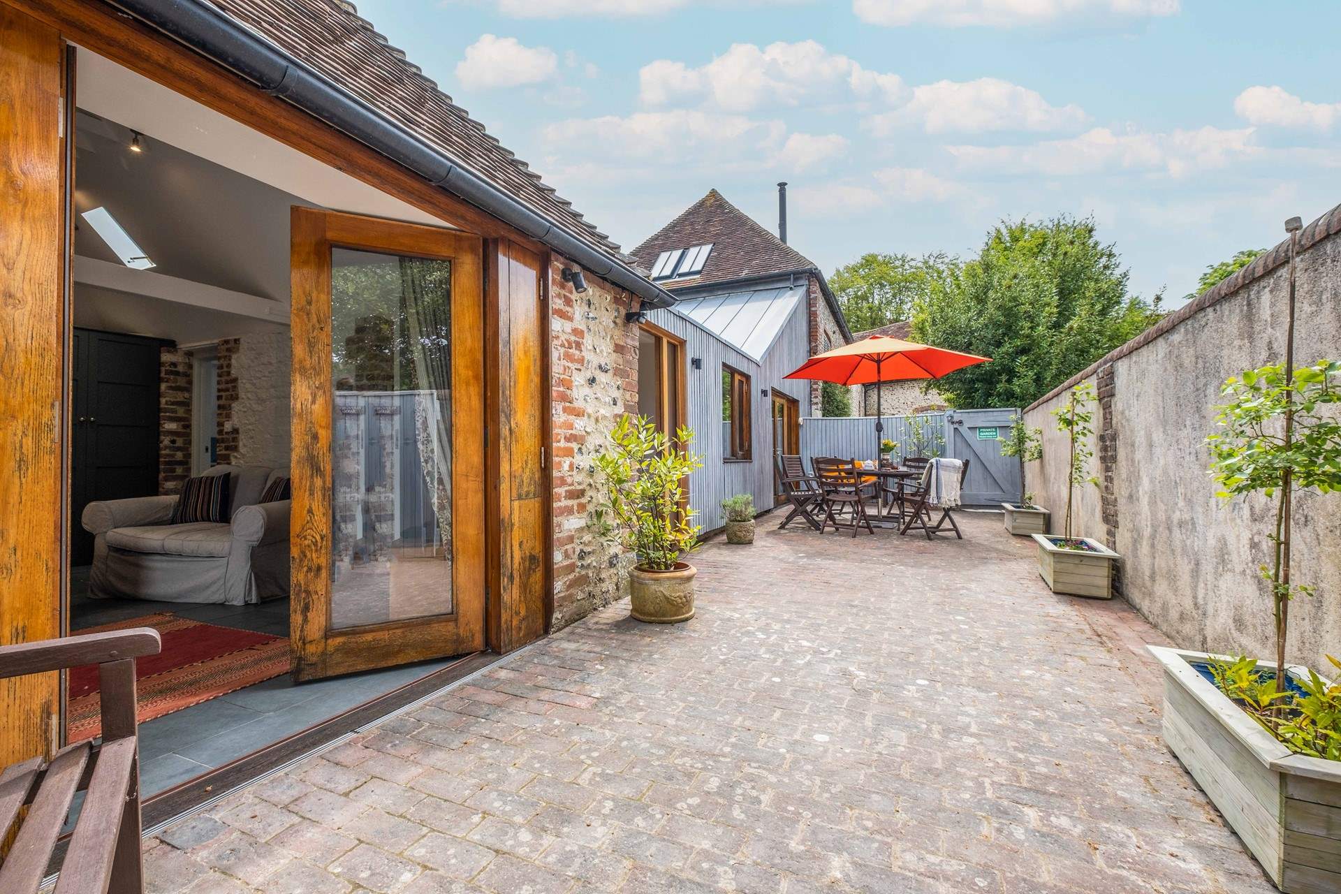 The courtyard is a peaceful setting and a wonderful spot to catch the afternoon sun or for al fresco dining.
