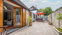 The courtyard is a peaceful setting and a wonderful spot to catch the afternoon sun or for al fresco dining.
