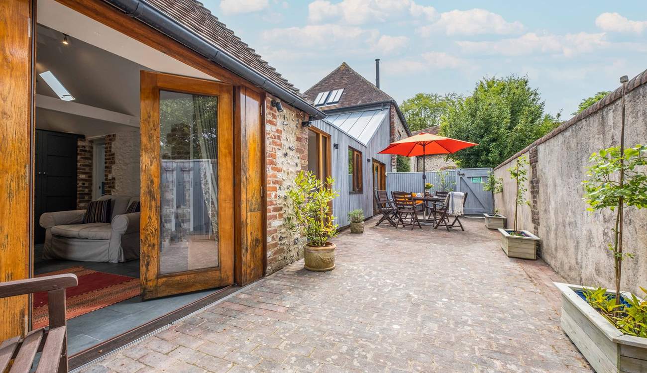 The courtyard is a peaceful setting and a wonderful spot to catch the afternoon sun or for al fresco dining.