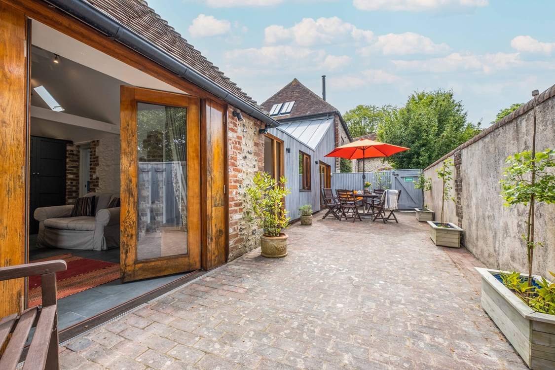 The courtyard is a peaceful setting and a wonderful spot to catch the afternoon sun or for al fresco dining.