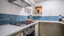 Just beside the living area is this lovely compact kitchen.