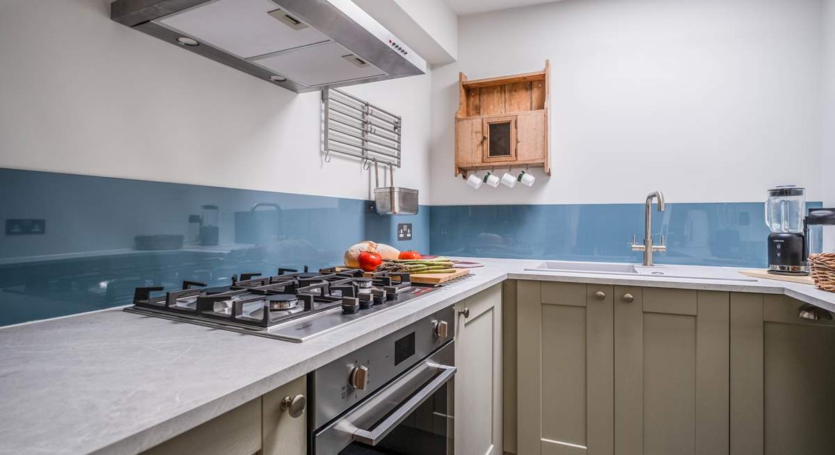 Just beside the living area is this lovely compact kitchen.