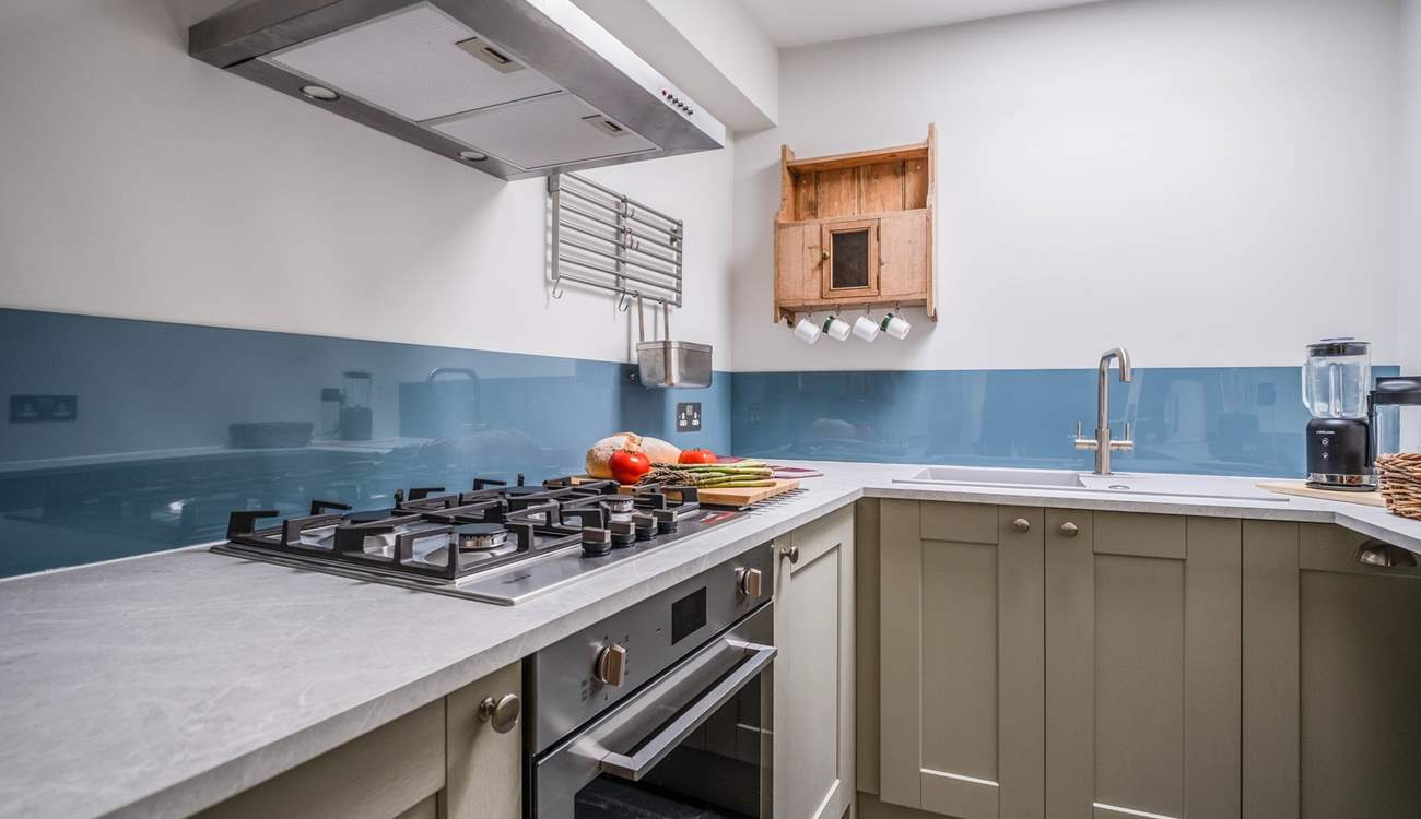 Just beside the living area is this lovely compact kitchen.