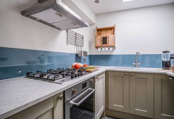 Just beside the living area is this lovely compact kitchen.