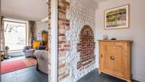 As you enter the hallway you will notice some lovely original features and local artwork.
